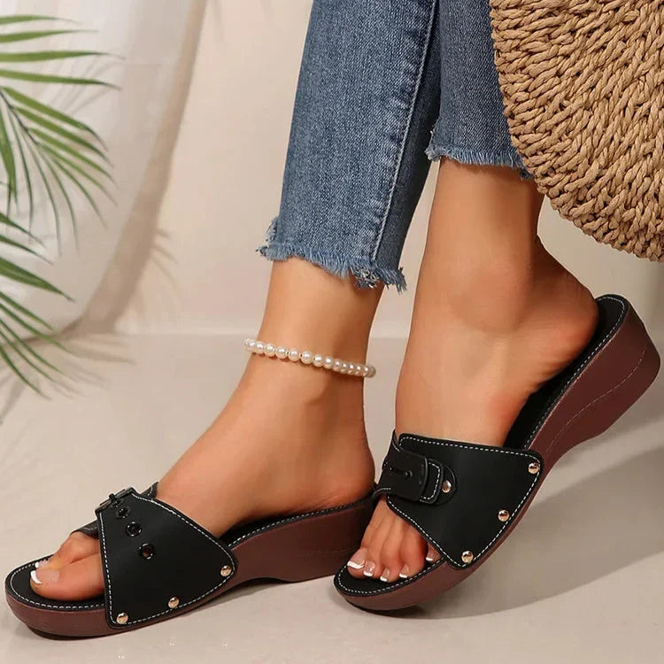 Matte buckle strap platform sandals with side rivet details in white, black and burgundy