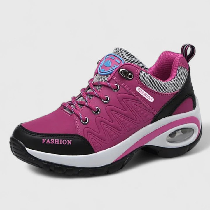 Leslie waterproof slip-on sneakers with low heel in a solid colour finish
