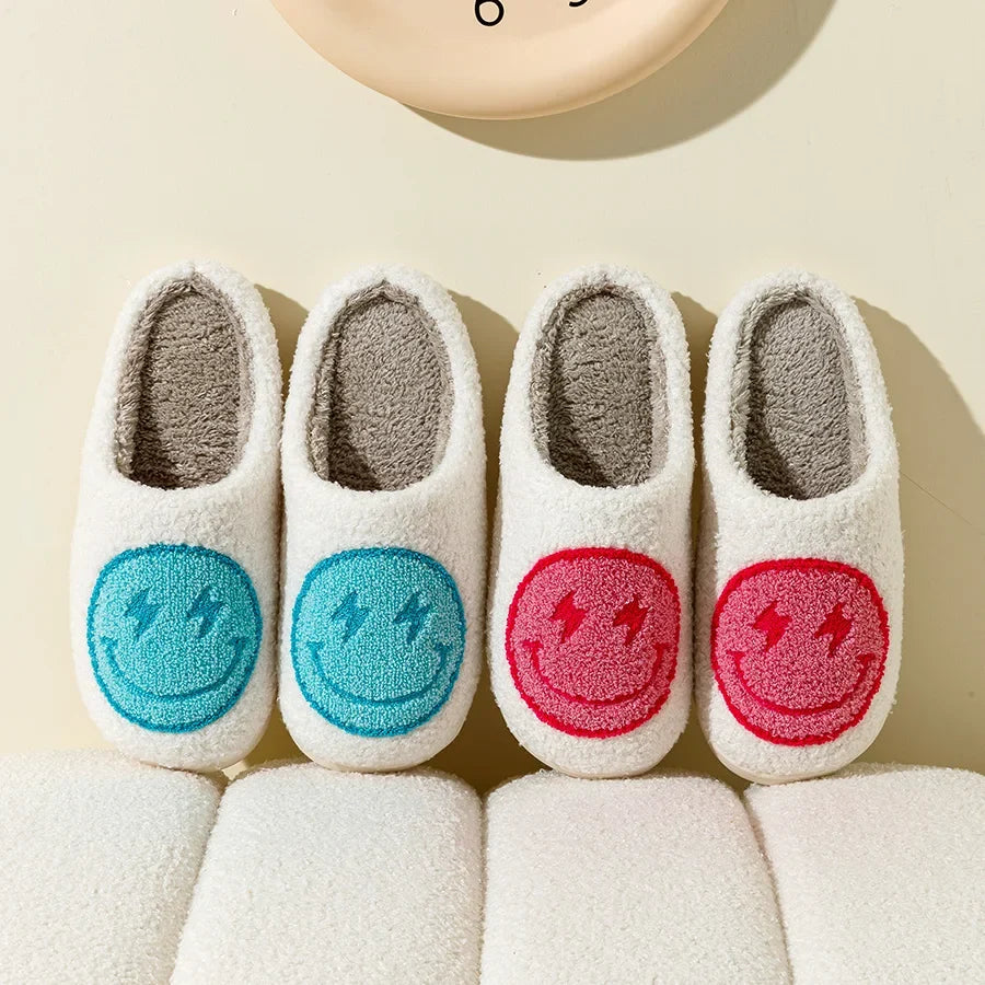 Fluffy smiley face house slippers for women in soft blue and pink