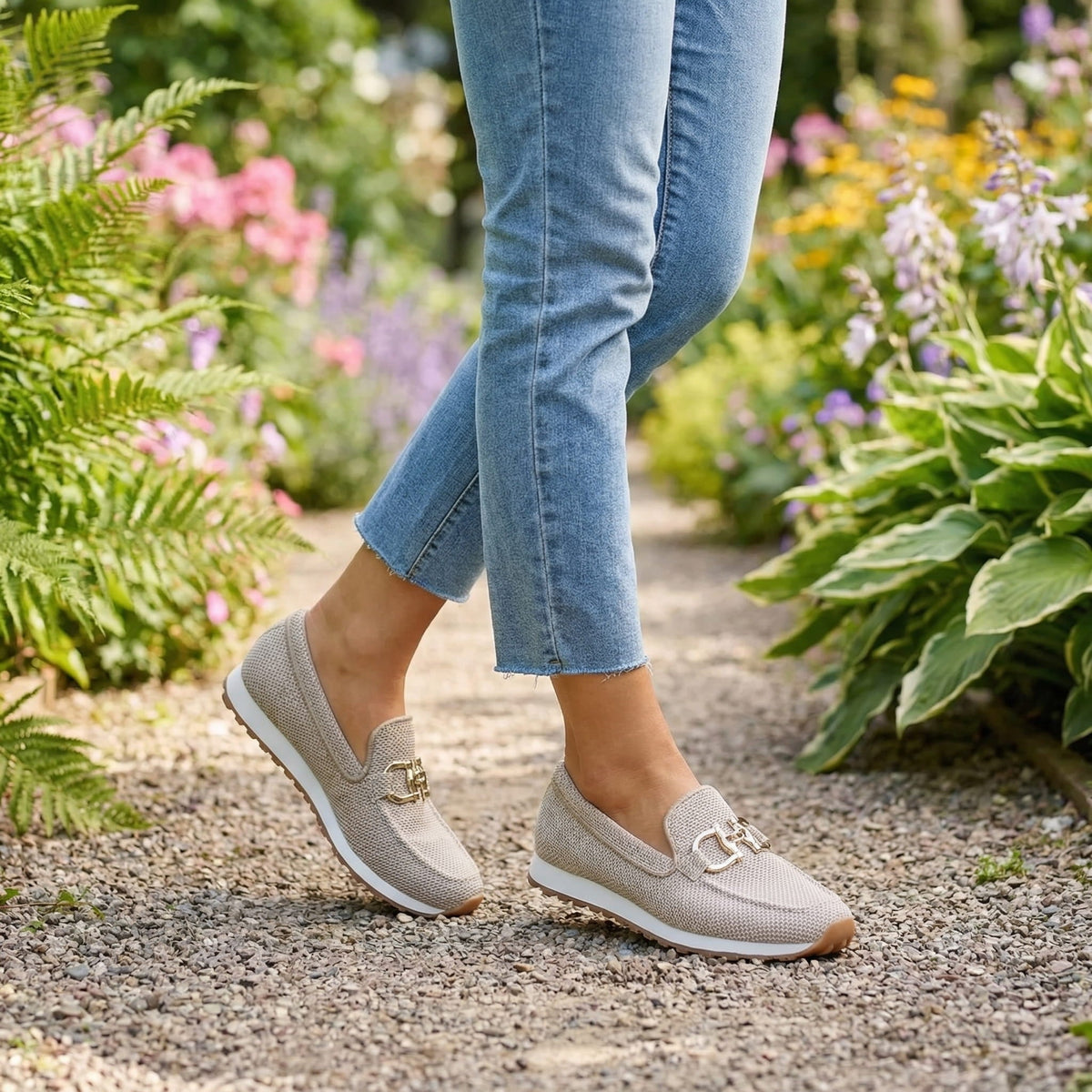 Womens slip-on loafers in neutral tones with a clean, casual silhouette
