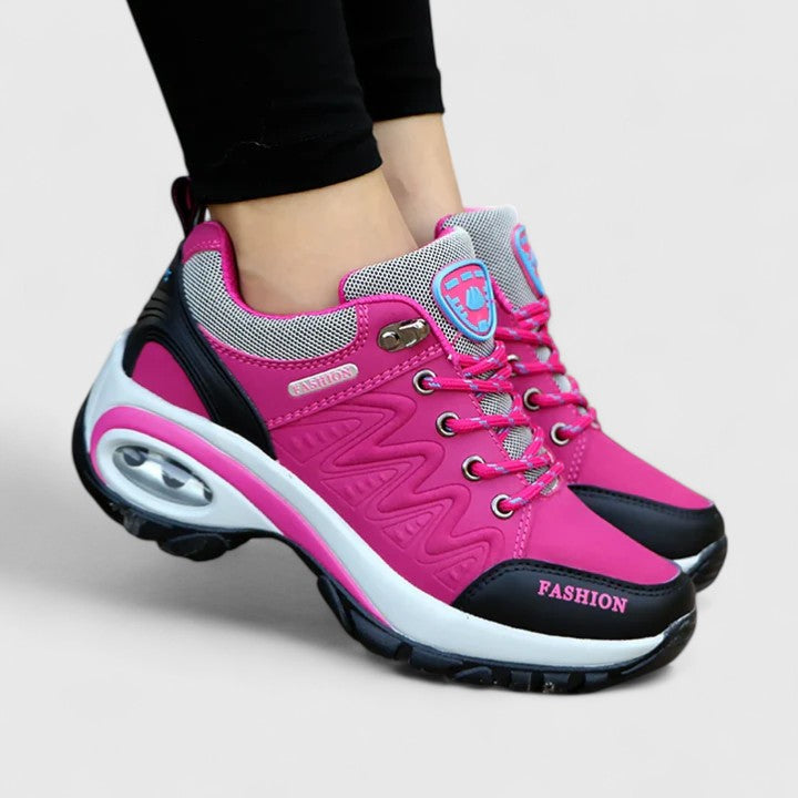 Leslie waterproof slip-on sneakers with low heel in a solid colour finish