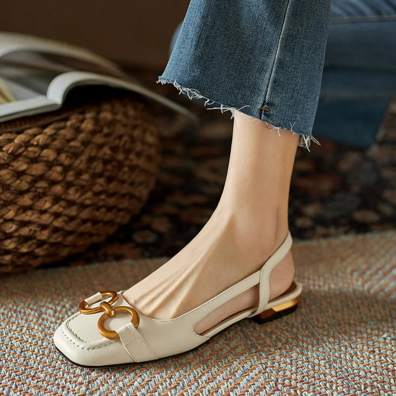 Leather slingback flat with vamp buckle, side cutout and squared toe