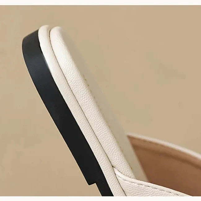 Semi-closed leather slippers with a low heel and open toe in ivory and khaki