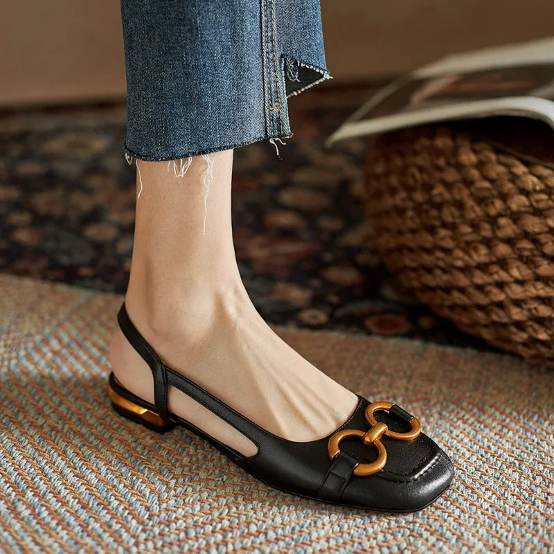 Leather slingback flat with vamp buckle, side cutout and squared toe