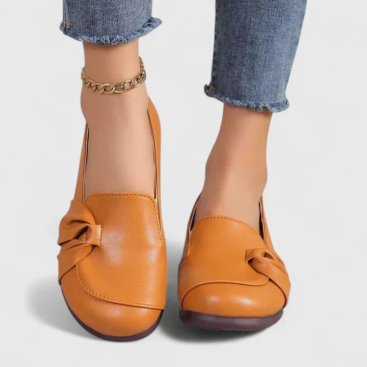 Iva elegant timeless heeled shoes shown in orange, black and beige