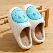 Fluffy smiley face house slippers for women in soft blue and pink