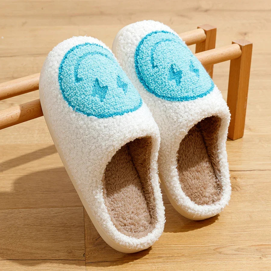 Fluffy smiley face house slippers for women in soft blue and pink