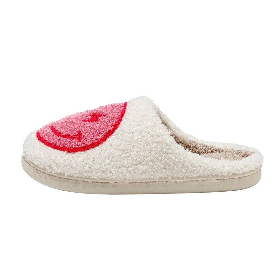 Fluffy smiley face house slippers for women in soft blue and pink