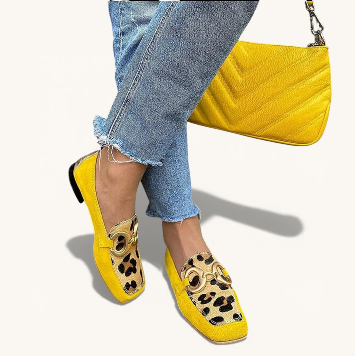 Yellow animal print women's loafers with a classic slip-on silhouette