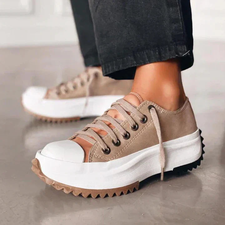 Elisa platform sneakers shown in brown, black and alpine white