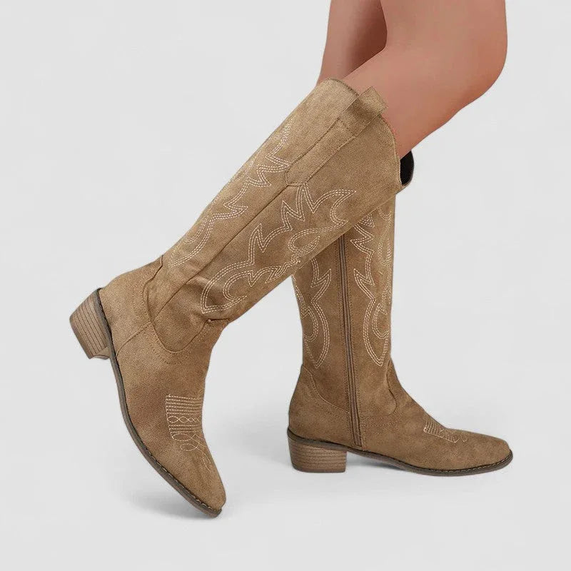 Clara orthopedic western ankle boots with faux-fur lining and side zip, shown in beige