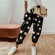 Fennimore black ethnic retro print pull-on pants with straight-leg silhouette and drawstring waist