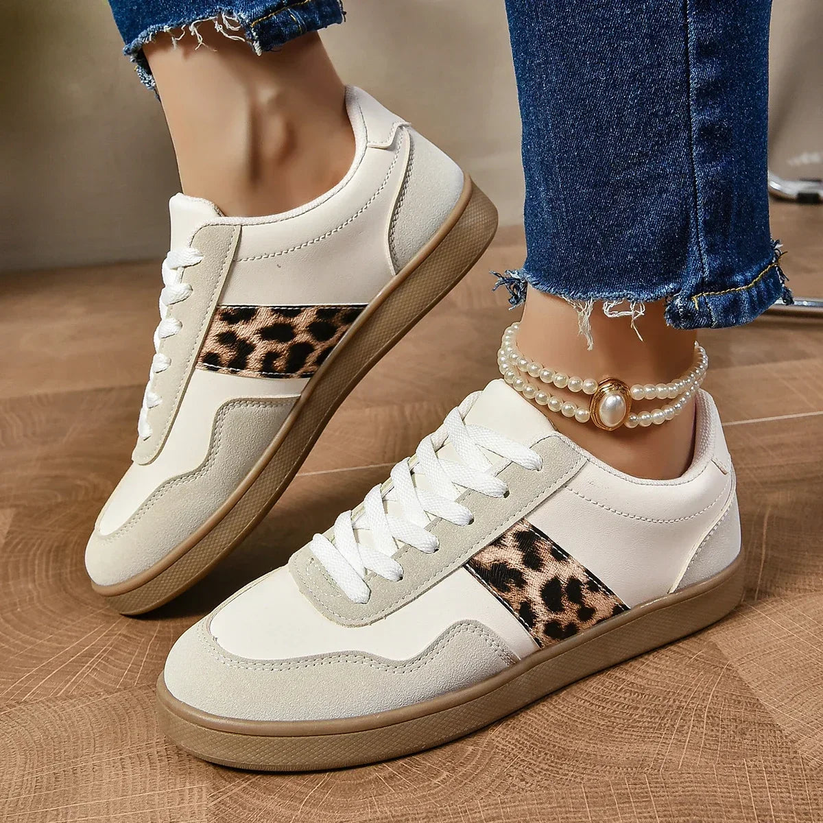 Leopard-print low-top sneakers with suede-texture panels in beige and black