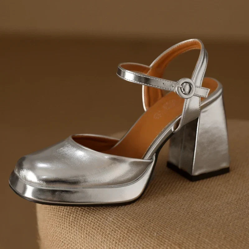 Flare heel closed-toe leather sandals in gold and silver