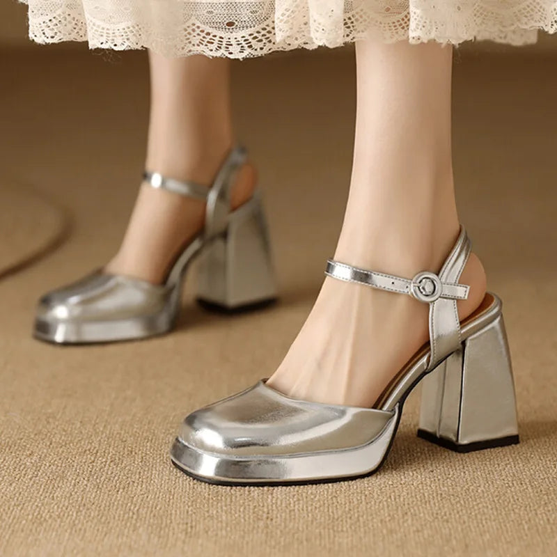 Flare heel closed-toe leather sandals in gold and silver