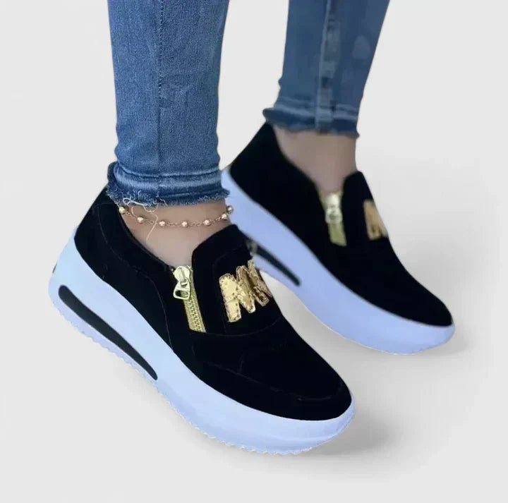 Comfortable everyday slip-on shoes shown in red, white, blue and black