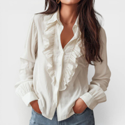 Anna ruffled reversible blouse in white with soft feminine ruffle detailing