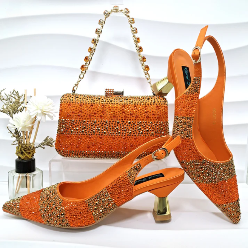 Rhinestone-embellished high heels with a matching sparkling handbag for special occasions