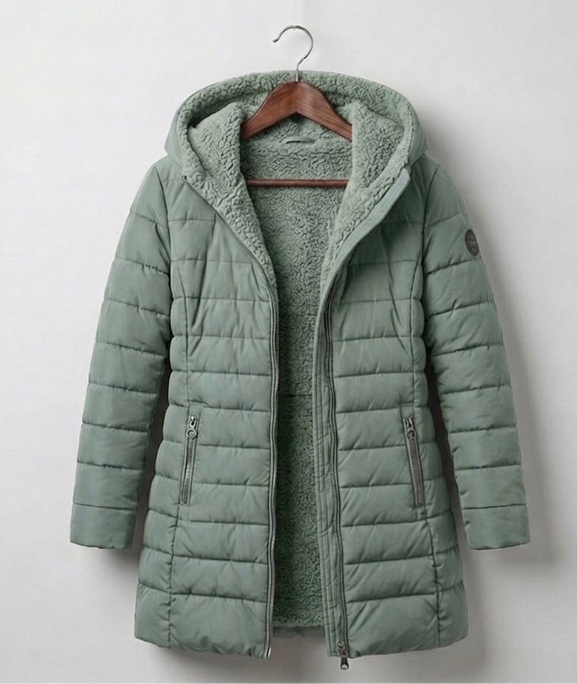 Olivia quilted A-line winter coat with sherpa-lined removable hood in green and black
