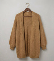 Oversized relaxed knit cardigan with dropped shoulders in a neutral colour