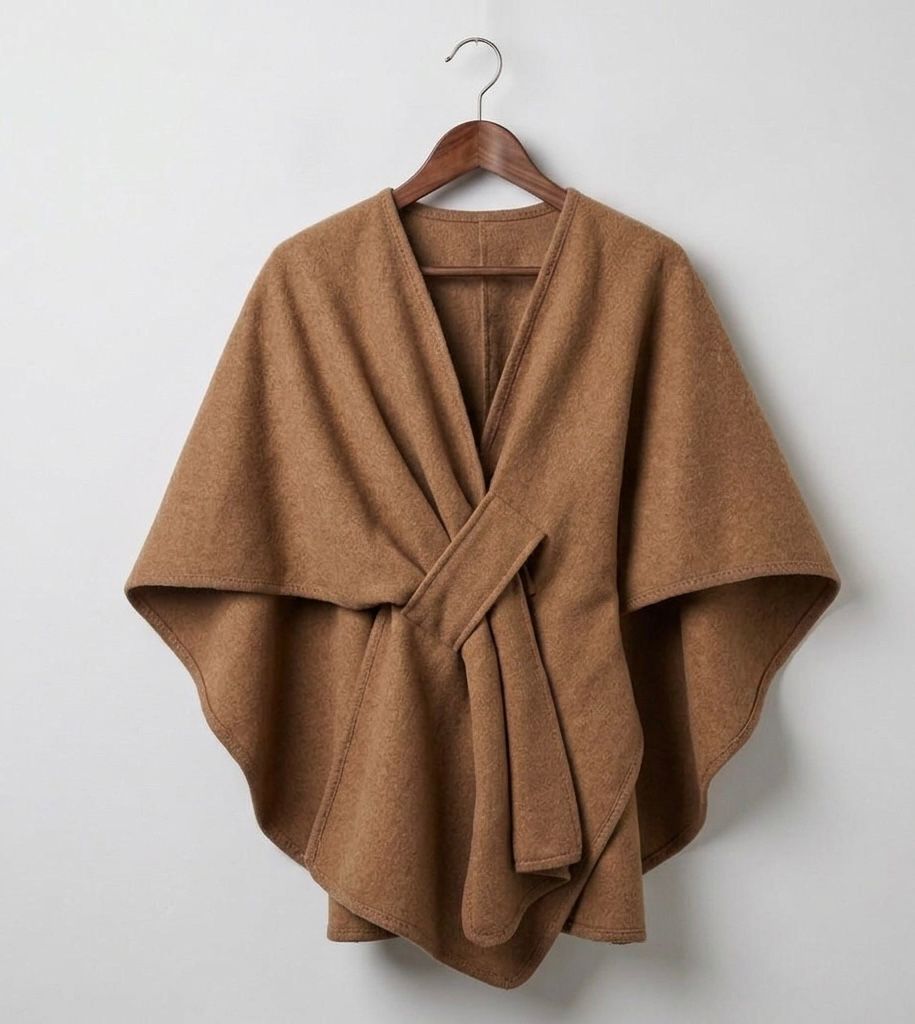 Marina caped fleece shawl draped over the shoulders in a relaxed universal fit