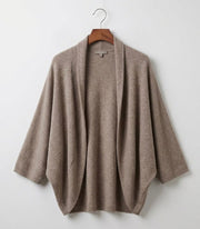 Alpina premium Merino wool shawl shown in tan, beige, black and red, oversized cut