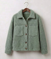 Luna plush teddy jacket with classic collar, front pockets and tortoiseshell-effect buttons