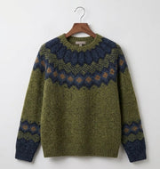 Green heritage Nordic knit jumper with patterned design and ribbed cuffs