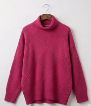 Angela relaxed-fit turtleneck jumper with subtle geometric knit pattern and ribbed cuffs