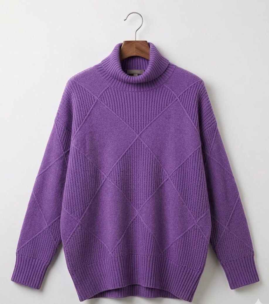 Angela relaxed-fit turtleneck jumper with subtle geometric knit pattern and ribbed cuffs