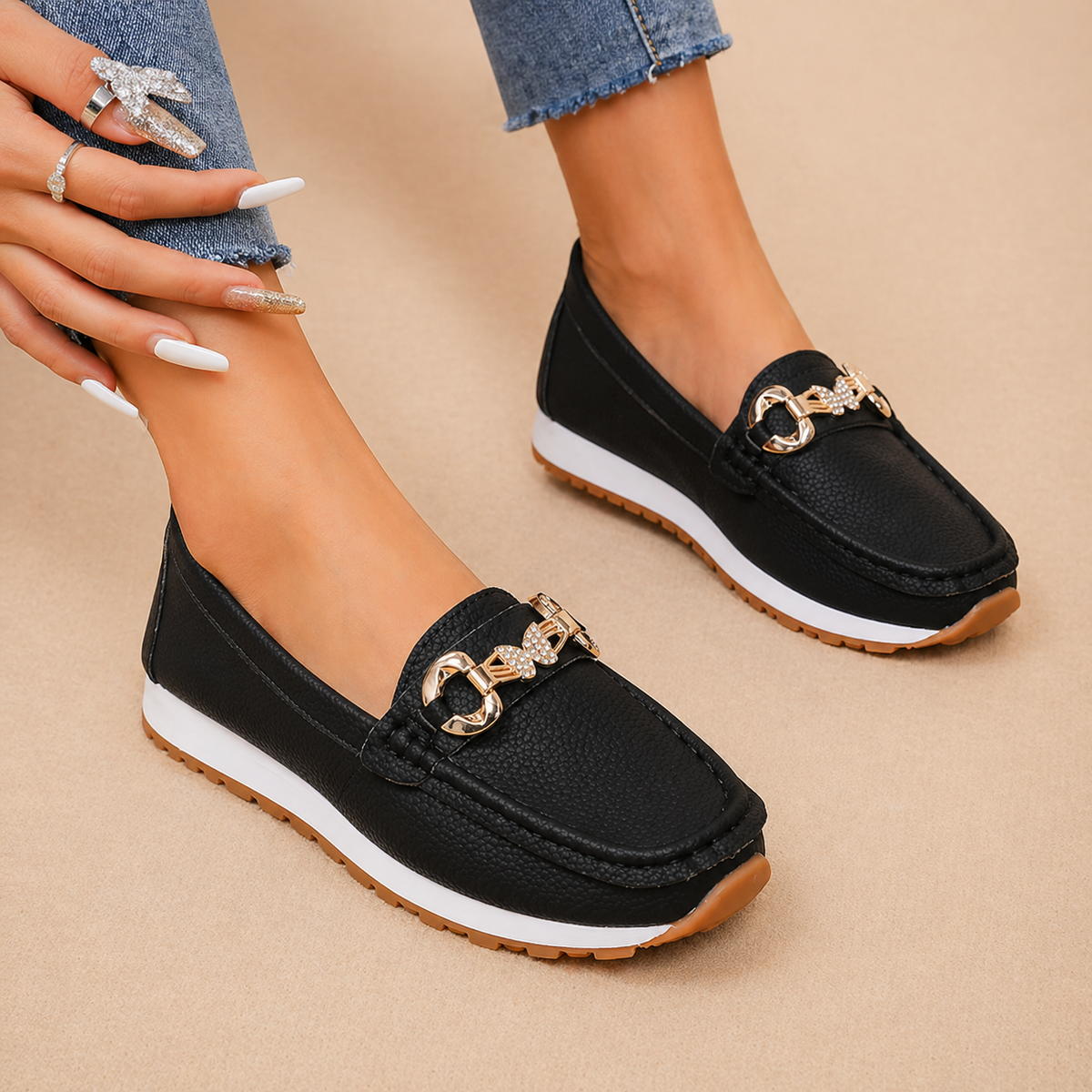 Hannah buckle loafers shown in black, beige and white