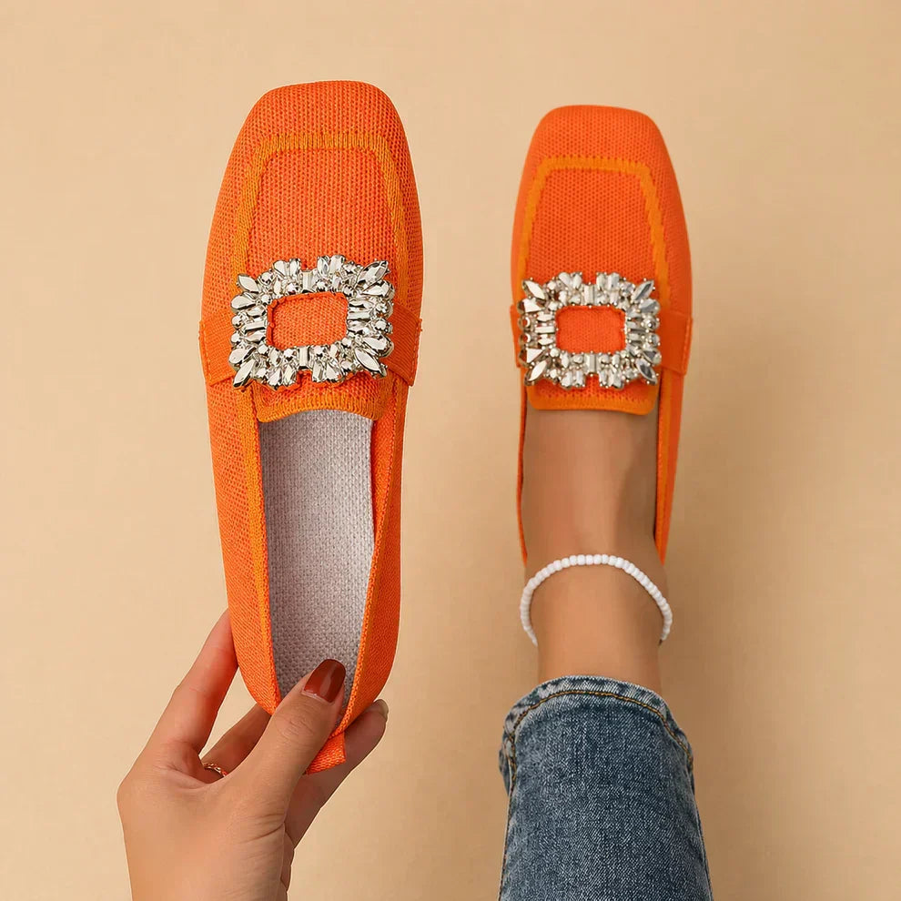 Womens buckle loafers with polished buckle detail and slip-on silhouette