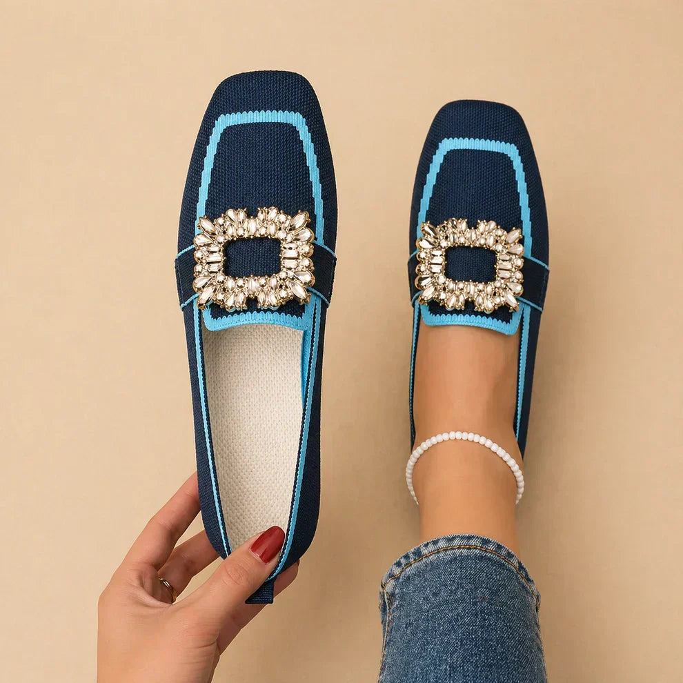 Womens buckle loafers with polished buckle detail and slip-on silhouette