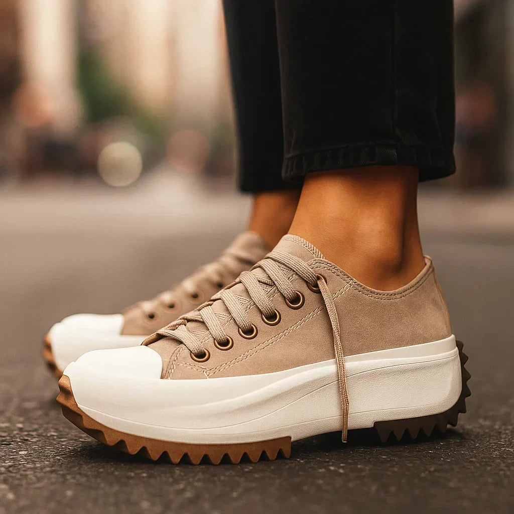 Imogen Rise platform sneakers shown in tiger print, classic black, white snow and light tan