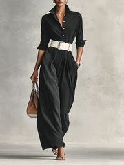 Black longline single-breasted jacket with a classic lapel, worn open