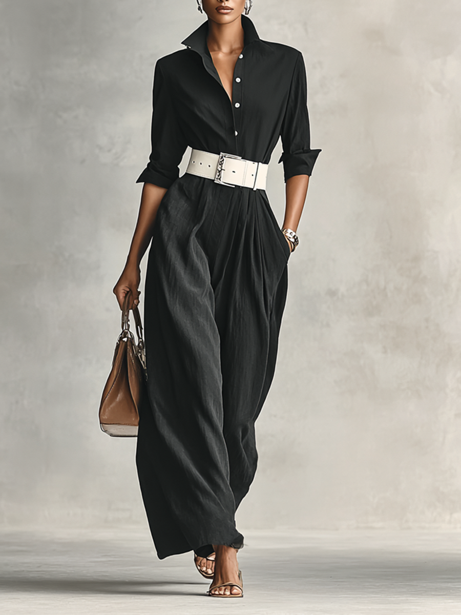 Black longline single-breasted jacket with a classic lapel, worn open