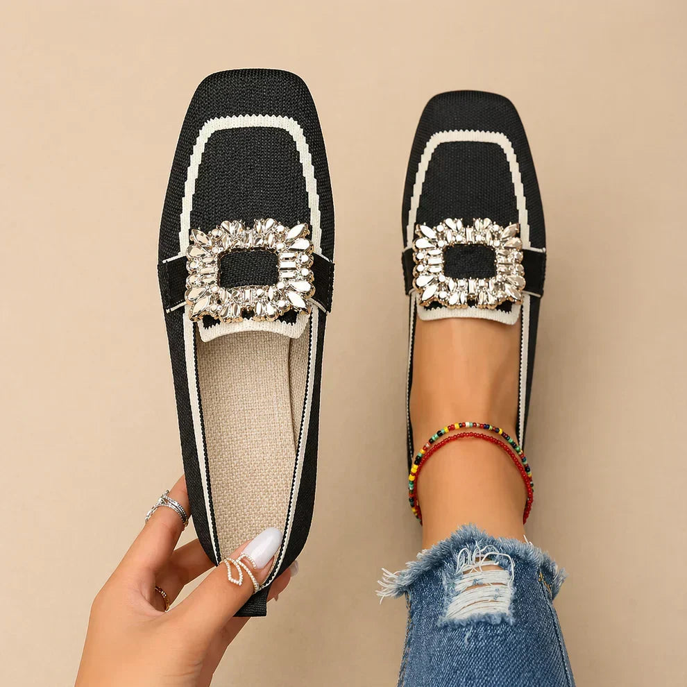 Womens buckle loafers with polished buckle detail and slip-on silhouette