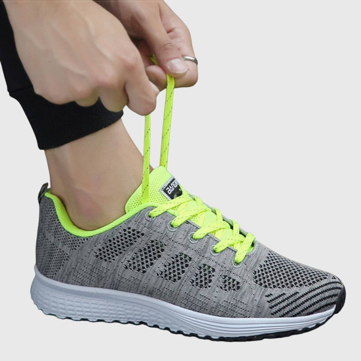 Betta comfortable slip-on sneakers shown in white and black colourways