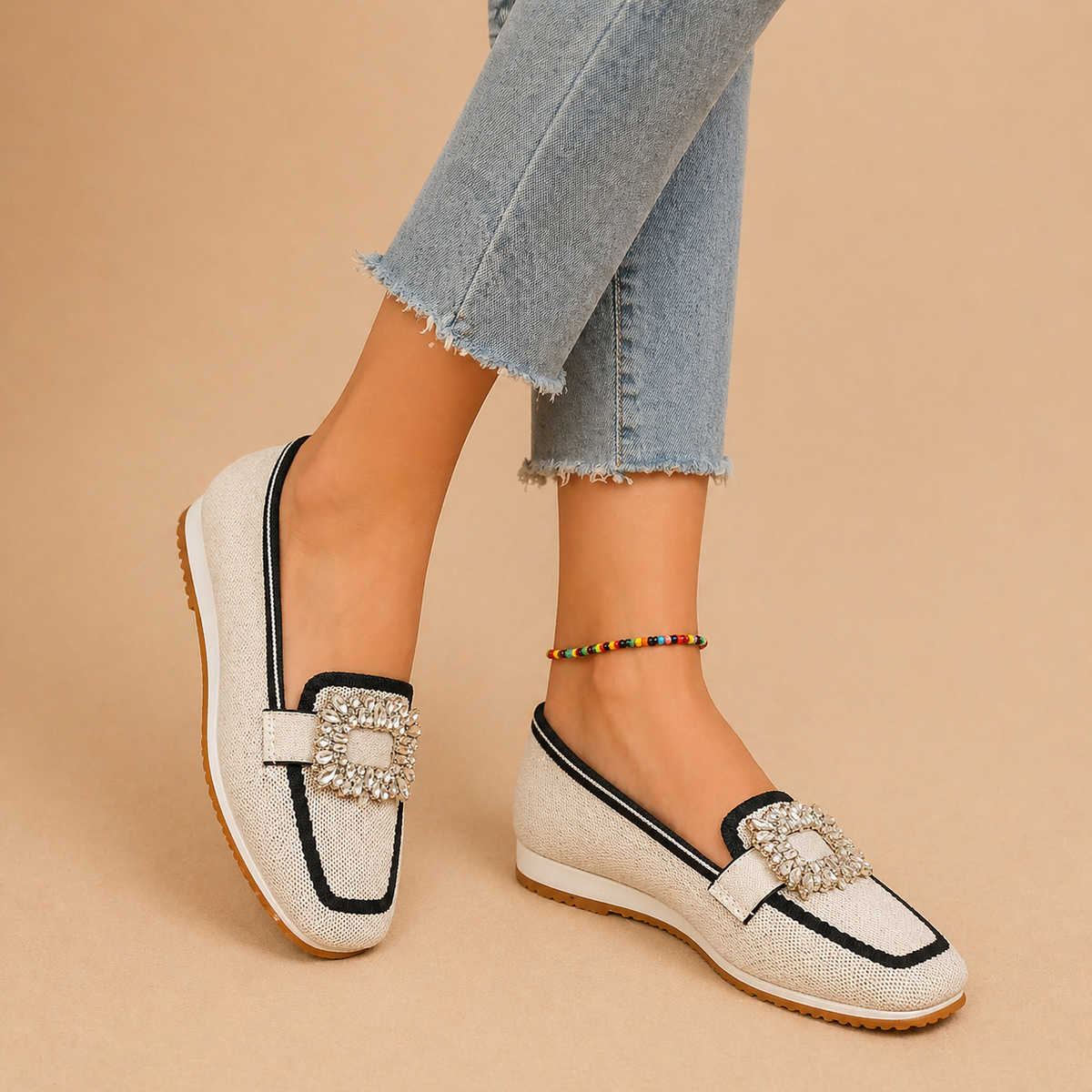 Womens buckle loafers with polished buckle detail and slip-on silhouette