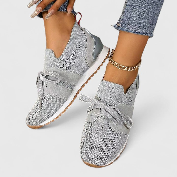 Women's everyday lace-up sneakers shown in several colour options