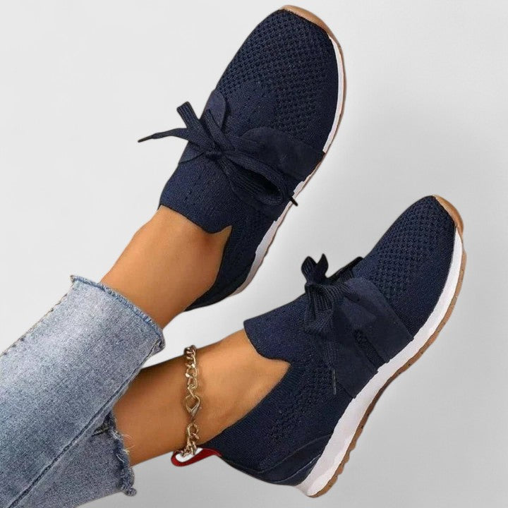 Women's everyday lace-up sneakers shown in several colour options