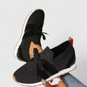 Women's everyday lace-up sneakers shown in several colour options