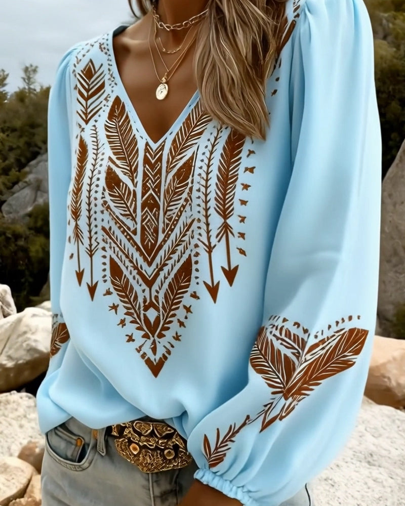 Sandra puffed sleeve blouse with wide V-neck, shown in white, blue and pink