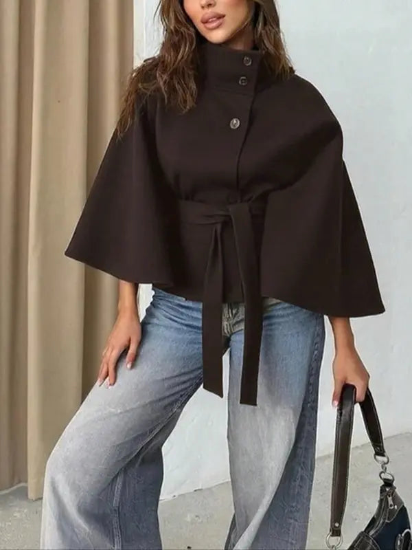 Thelma front buckle belted coat with tailored waist, shown in a neutral tone