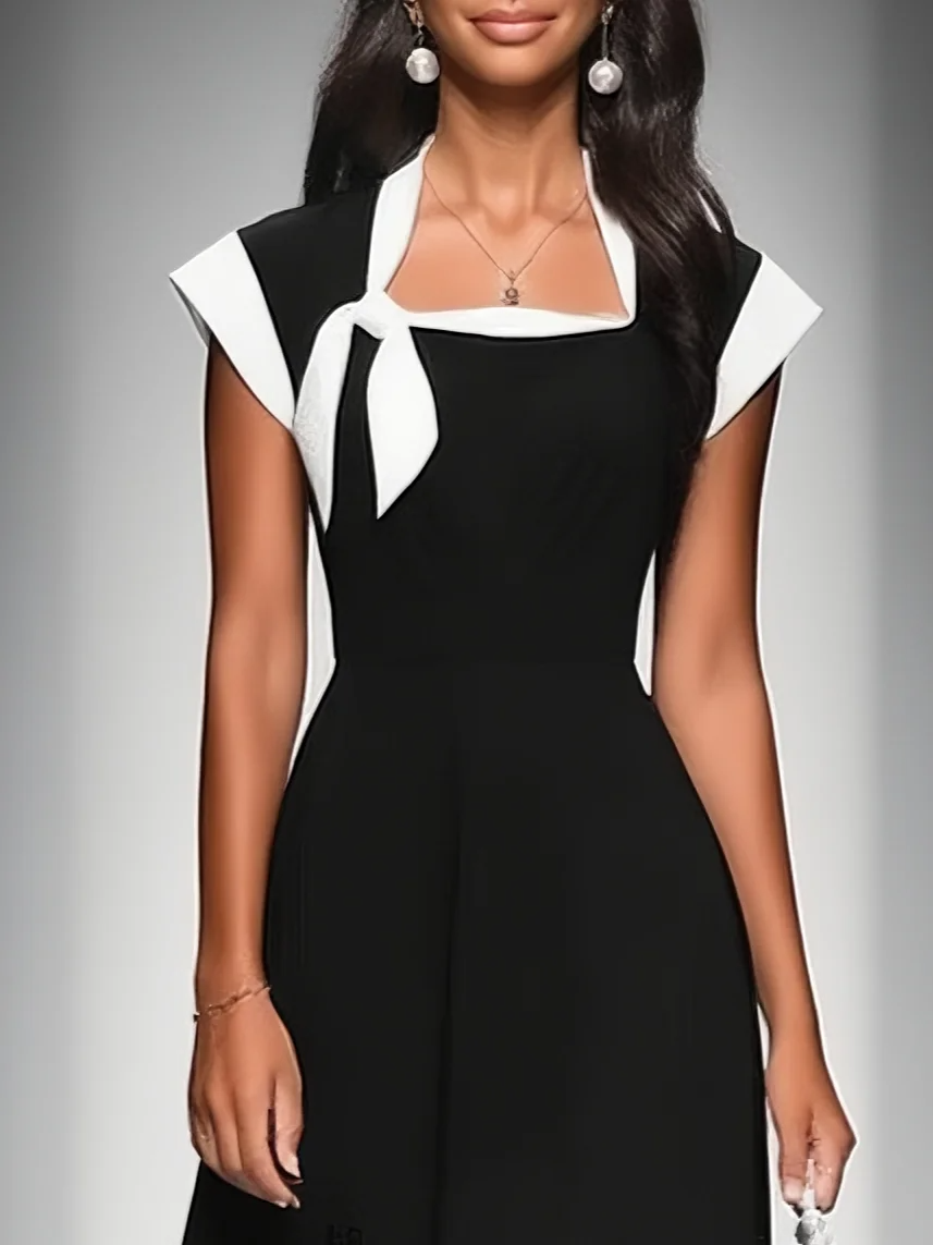 Vanessa black colorblock top with a square neckline styled for everyday wear