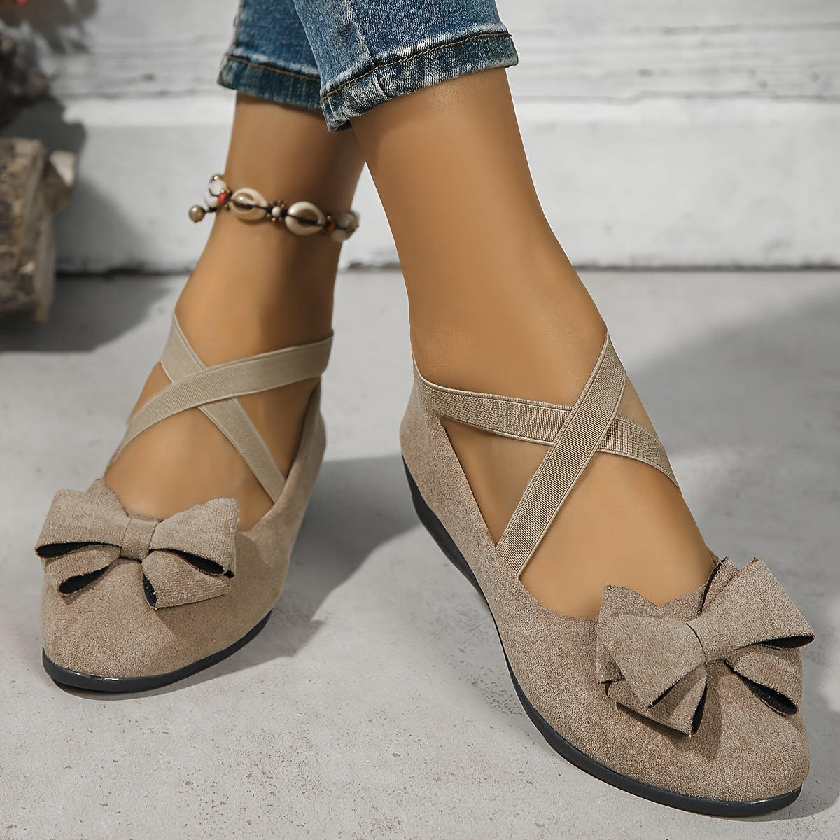 Krysa stylish wedge flats with crossed elastic bands, shown in neutral colours