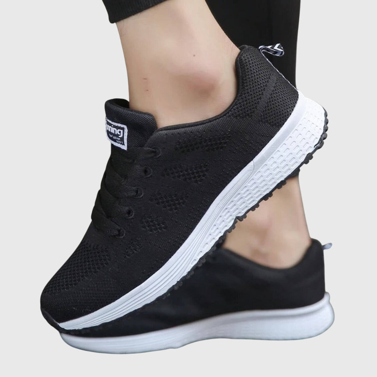 Betta comfortable slip-on sneakers shown in white and black colourways