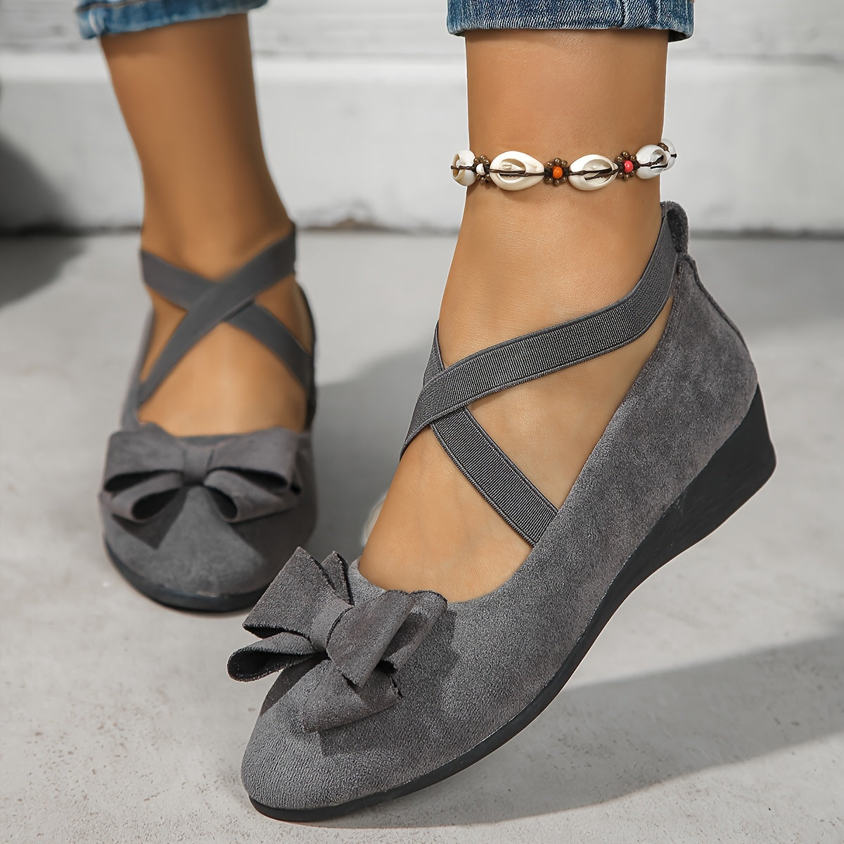 Krysa stylish wedge flats with crossed elastic bands, shown in neutral colours