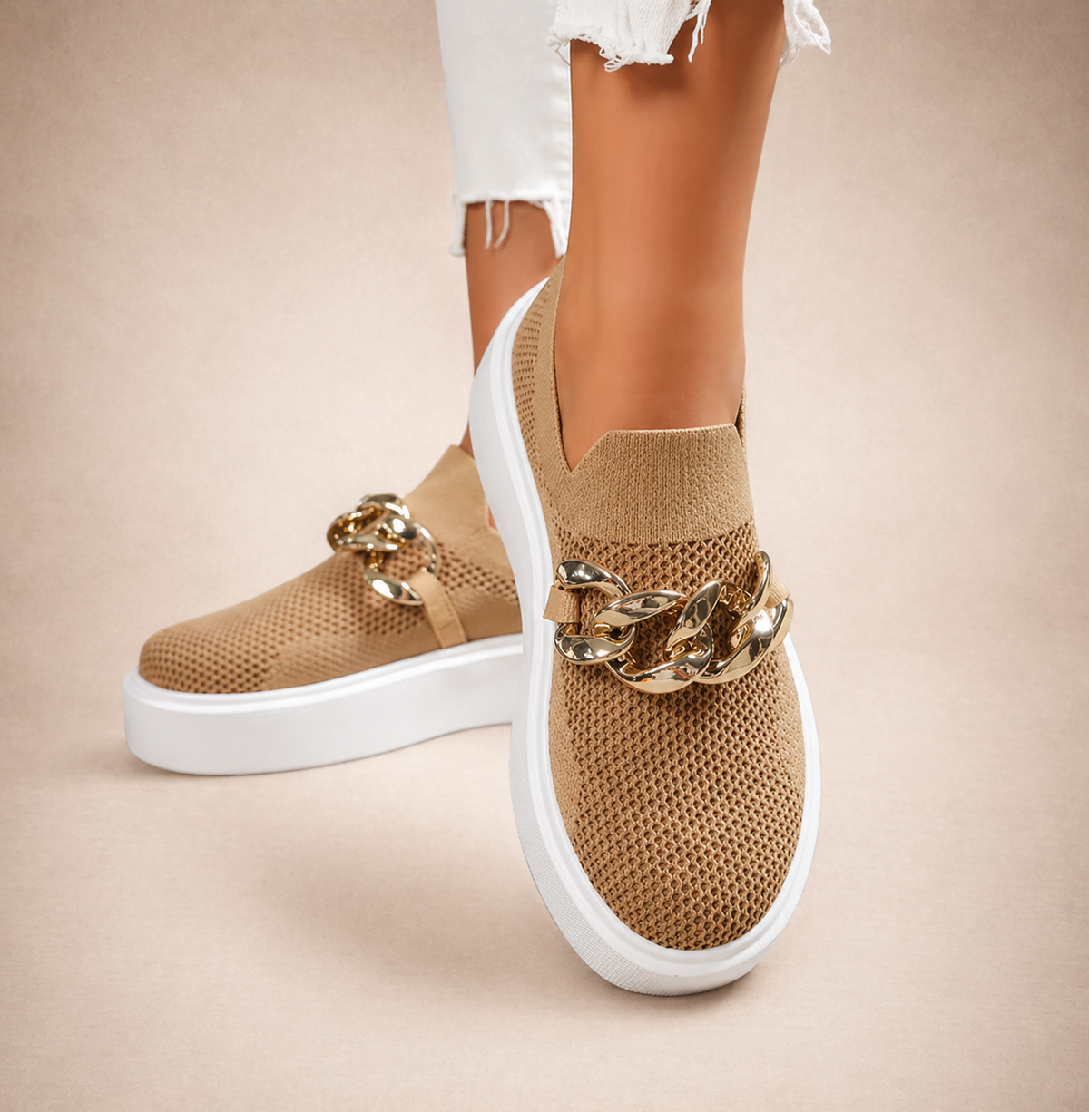 Womens chain-detail slip-on loafers shown in black, camel, white and red