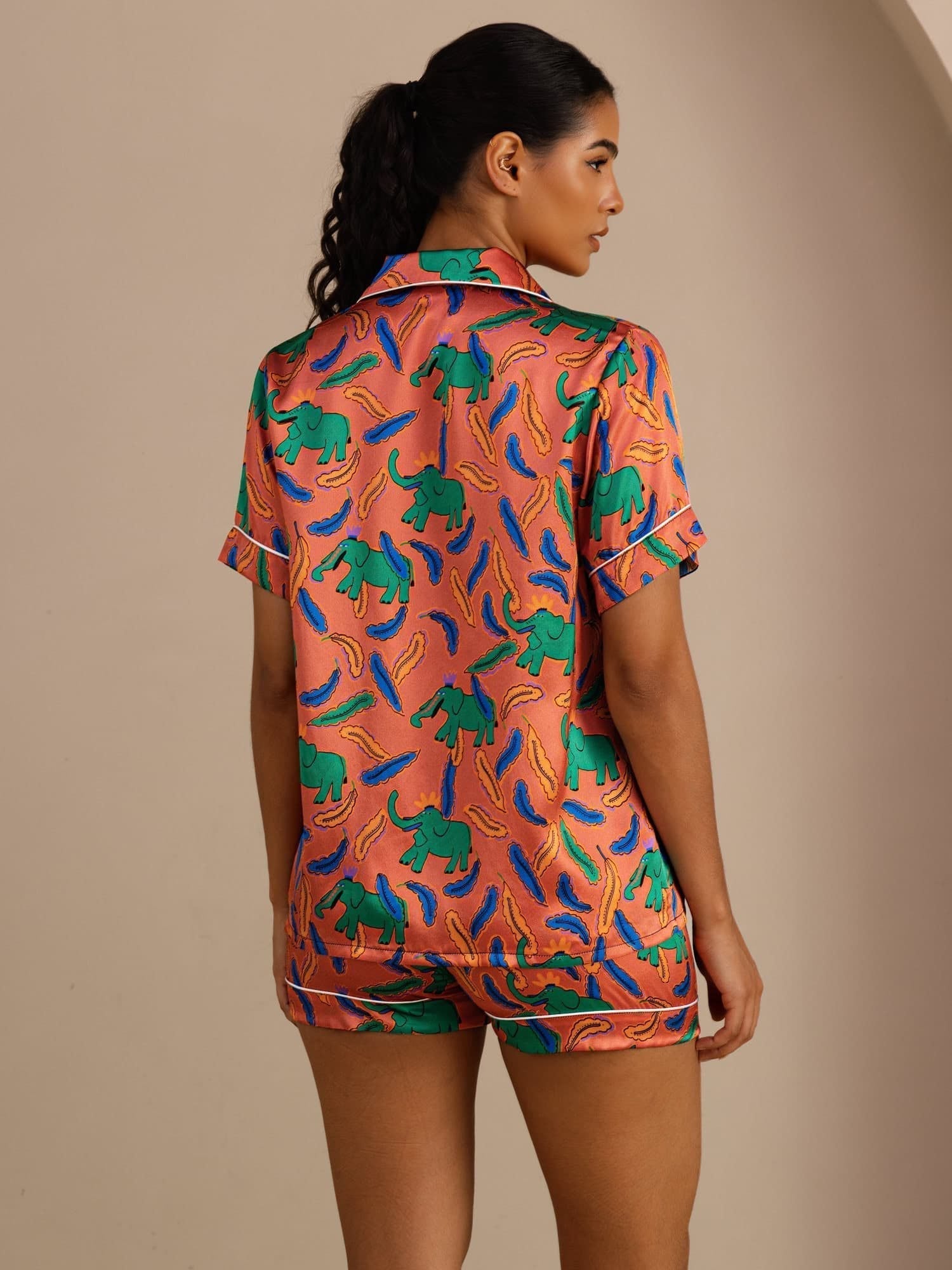 Adriana pleated pure silk pyjama set in clay elephant print, coordinated top and trousers